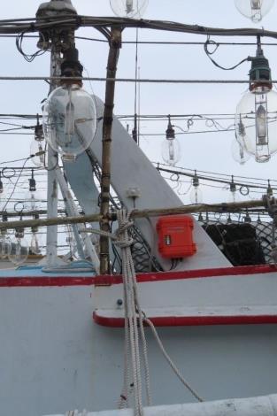 Figure 1. An automatic collection system of fishing vessel operation information installed on a fishing vessel with torch light nets