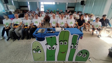 Photo 3. Group photo of parent-child seagrass planting—Gangzi restoration planting of seagrass